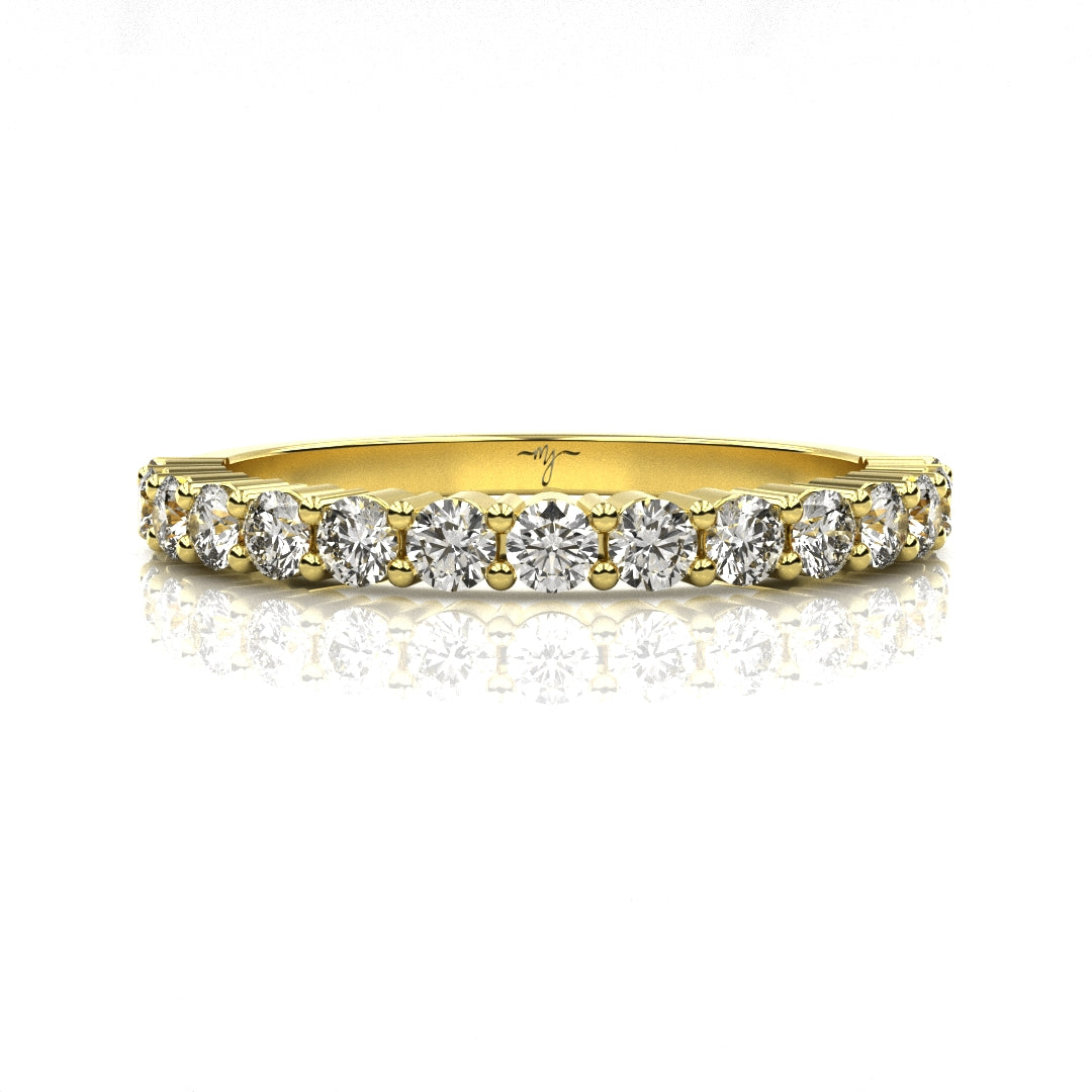18ct Gold ring with diamonds on a white background