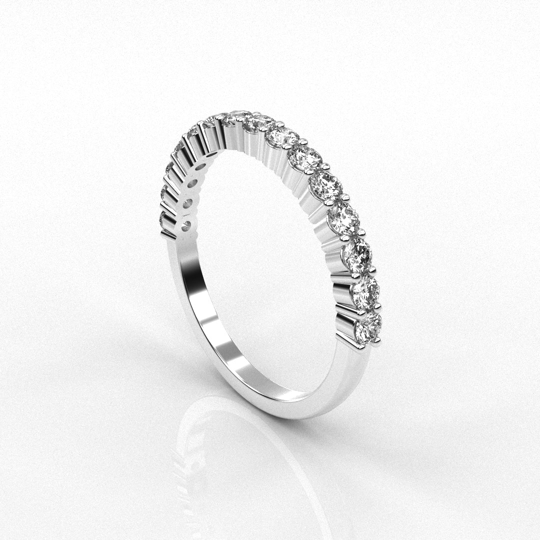 white gold ring with diamond accents on a white background