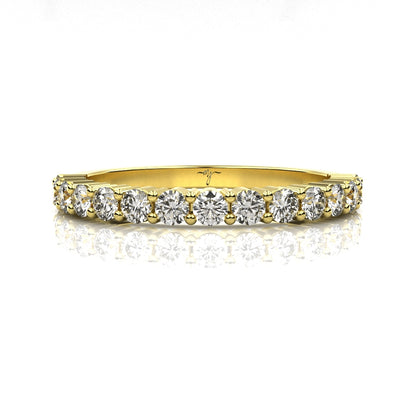 18ct Gold ring with diamonds on a white background